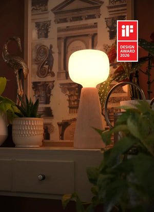 Soltech Aura on a shelf with plants and architectural decor, featuring an iF Design Award 2026 logo.