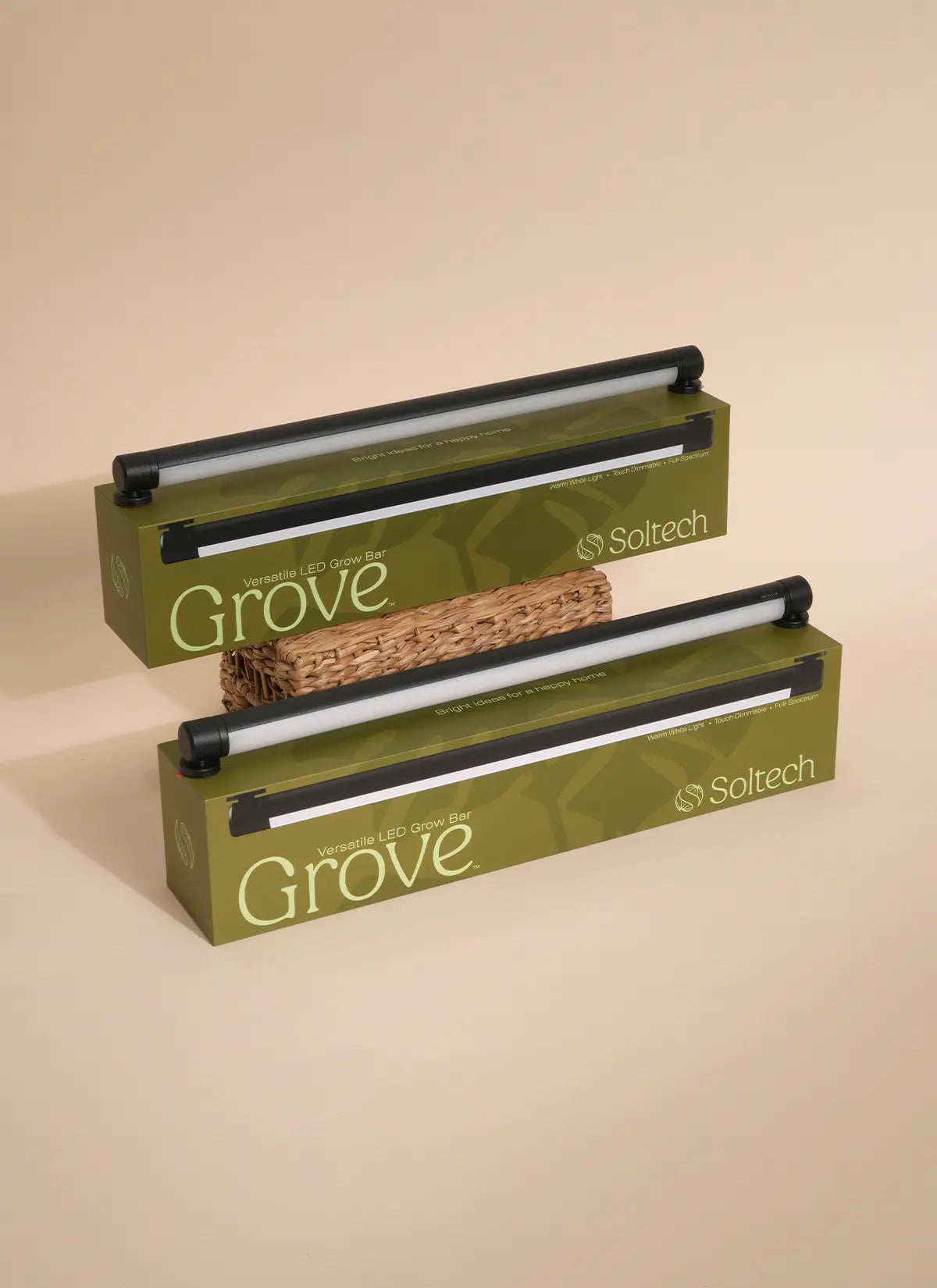 Two Black Soltech Grove plant grow lights in packaging, one above the other, with predominantly white and green colors.