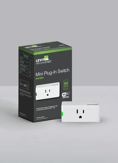 Leviton mini plug-in switch packaging with switch on a gray background