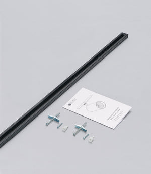 A Highland track rail system with components laid out on a white background, including mounting brackets and a power source not included note.